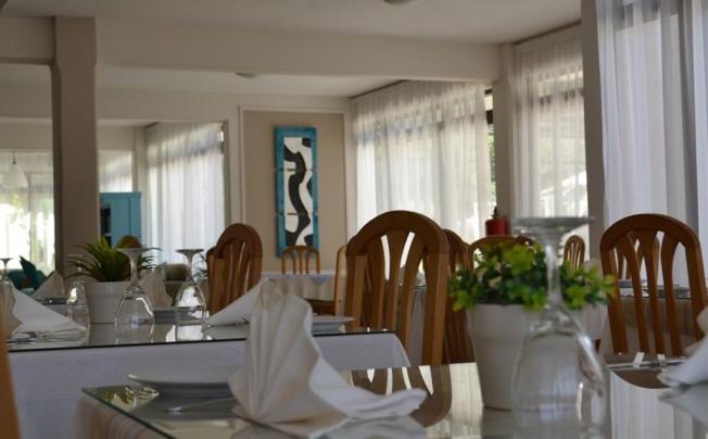 Фото отеля Tasiana Hotel Apartments