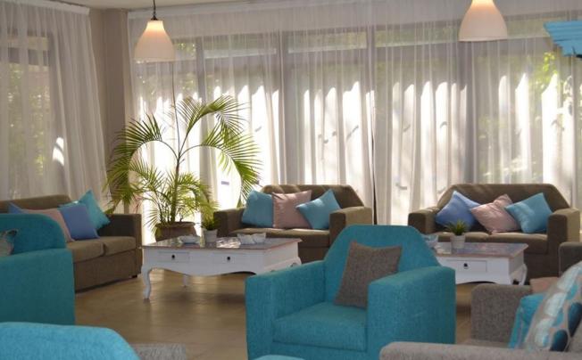 Фото отеля Tasiana Hotel Apartments