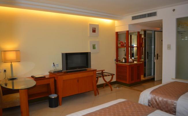 Фото отеля Oscar Hotel Haikou