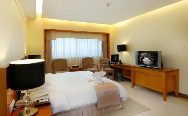Фото отеля Oscar Hotel Haikou