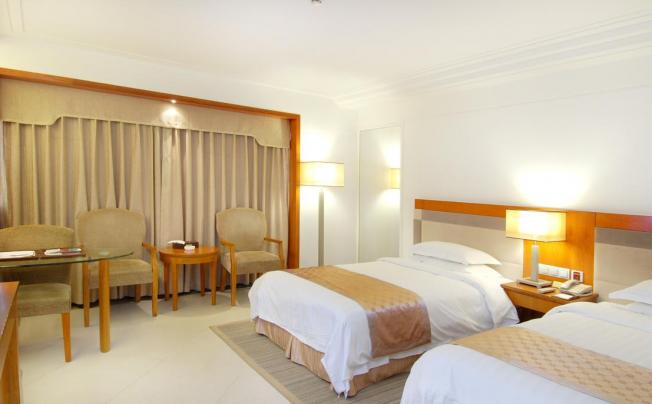 Фото отеля Oscar Hotel Haikou