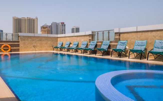 Фото отеля Tulip Inn Al Khan hotel