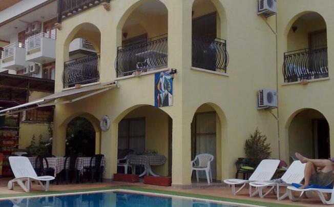 Фото отеля SARIGUL APARTMENTS
