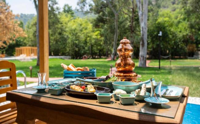 Фото отеля SUNA VILLAGE HOTEL & BUNGALOW FETHIYE