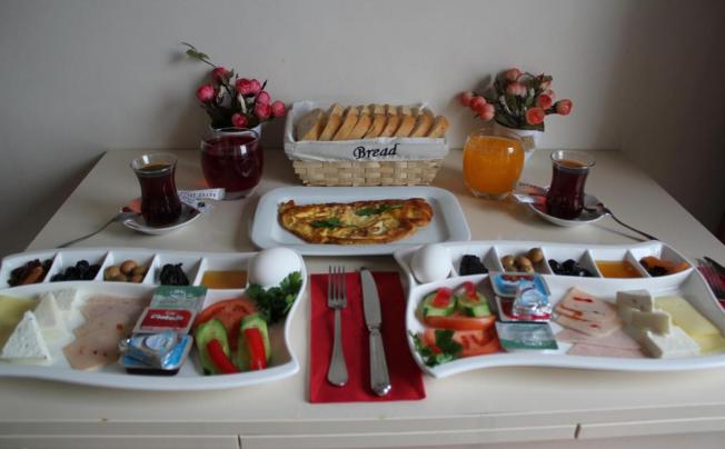 Фото отеля Zendy Suite Hotel