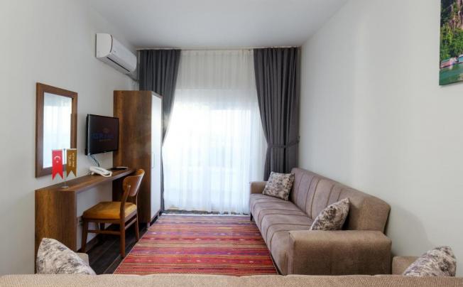 Фото отеля GRAND GULLUK HOTEL