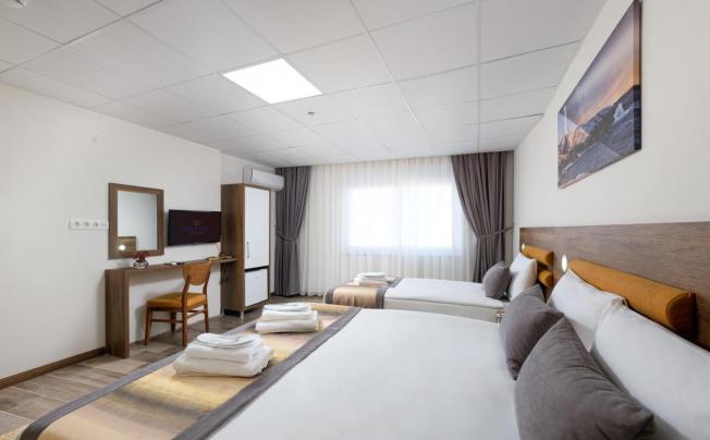 Фото отеля GRAND GULLUK HOTEL
