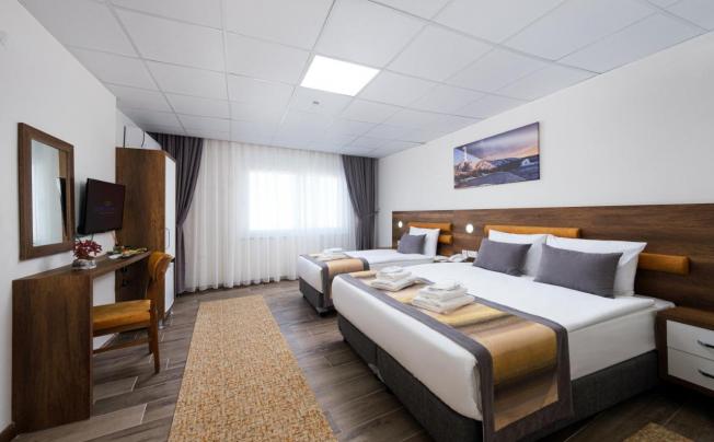 Фото отеля GRAND GULLUK HOTEL