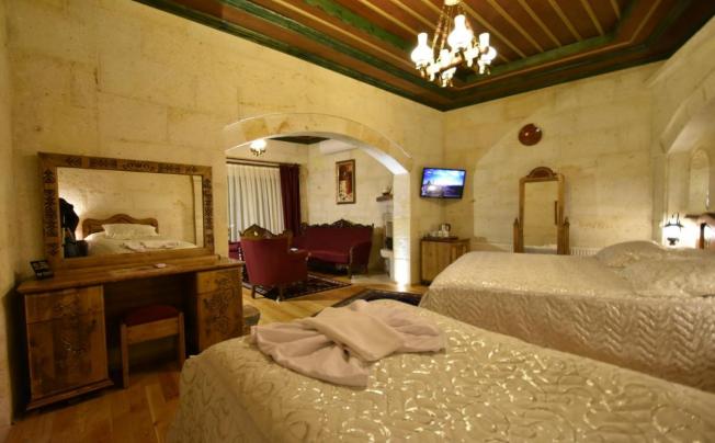 Фото отеля HARMAN CAVE HOTEL