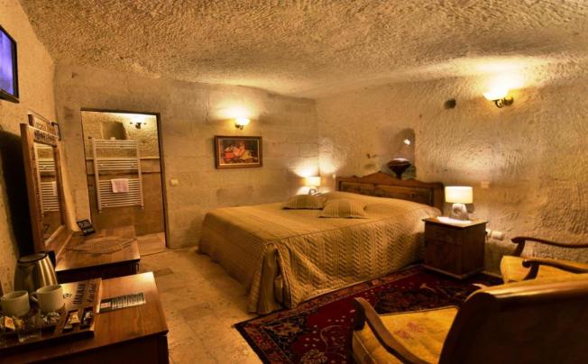 Фото отеля HARMAN CAVE HOTEL
