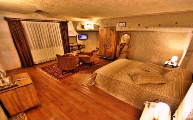 Фото отеля HARMAN CAVE HOTEL