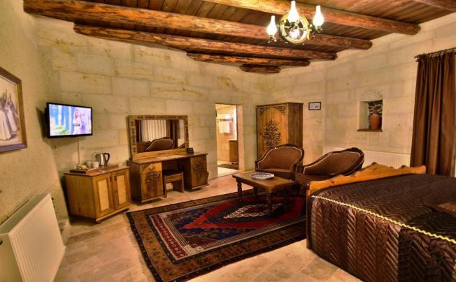 Фото отеля HARMAN CAVE HOTEL