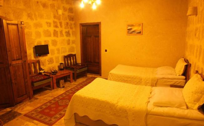 Фото отеля DILEK TEPESI CAVE HOTEL