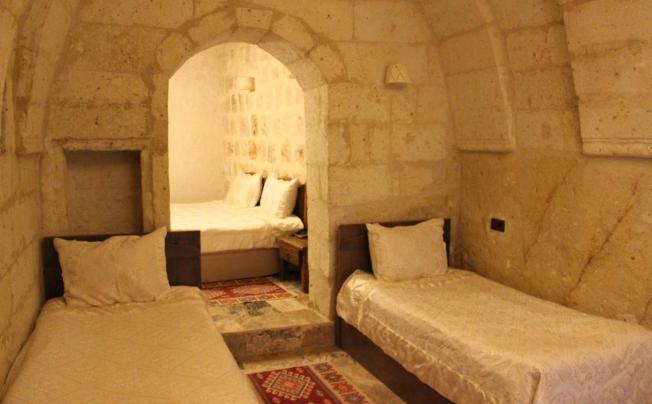 Фото отеля DILEK TEPESI CAVE HOTEL
