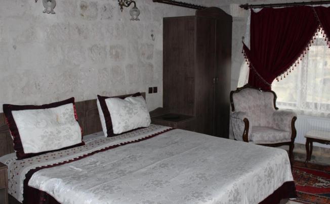 Фото отеля DILEK TEPESI CAVE HOTEL