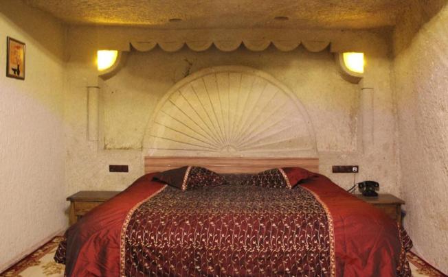 Фото отеля DILEK TEPESI CAVE HOTEL
