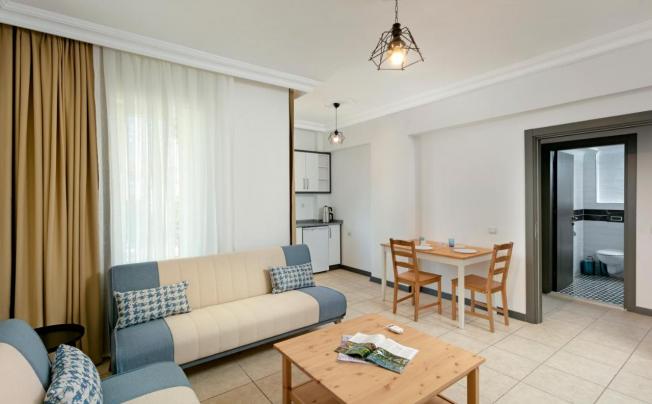 Фото отеля OTIUM BOUTIQUE HAPPY SUITES 