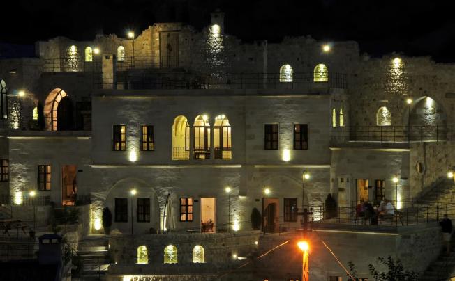 Фото отеля Dere Suites Cappadocia