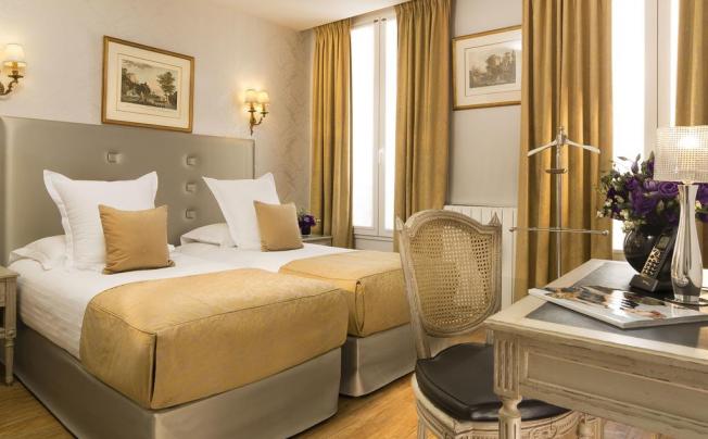 Фото отеля HOTEL PLAZA ELYSEES 