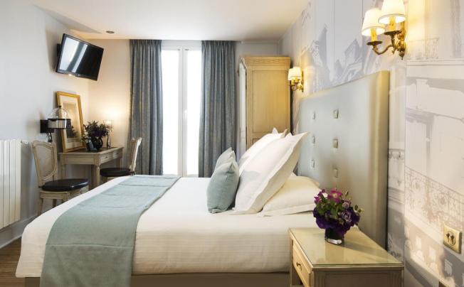 Фото отеля HOTEL PLAZA ELYSEES 