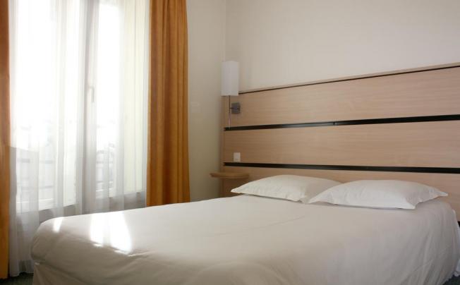 Фото отеля NEW HOTEL SAINT LAZARE 