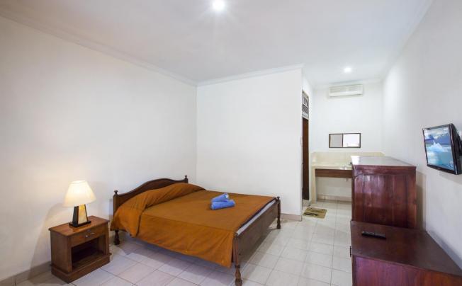 Фото отеля SURYA TROPICAL HOTEL KUTA