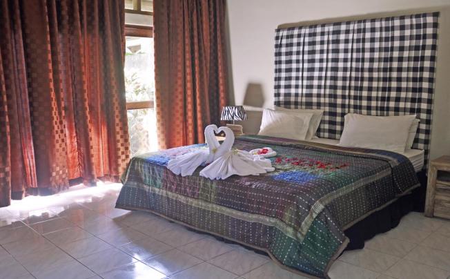 Фото отеля BAYSIDE BUNGALOWS CANDIDASA
