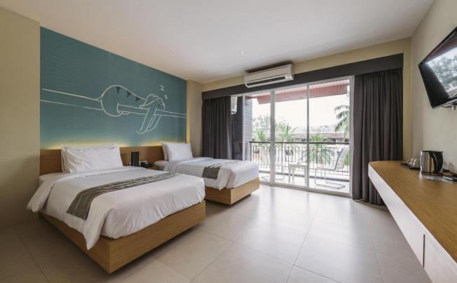 Фото отеля Tiras Patong Beach