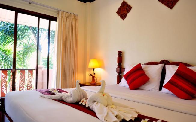 Фото отеля LANTA SEAFRONT RESORT